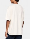CAMISETA TOMMY JEANS FLAG BADGE OVERSIZED TEE  ASH GREY