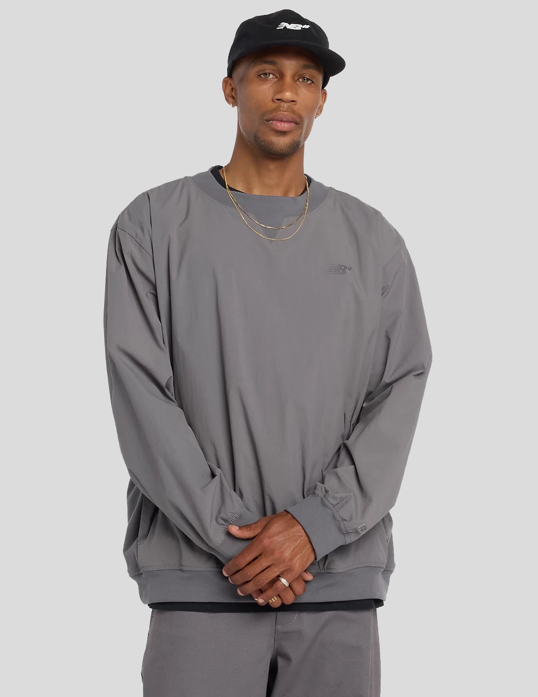 SUDADERA NEW BALANCE NUMERIC NUMERIC WOVEN CREW  CASTLE ROCK 