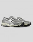 ZAPATILLAS NEW BALANCE 1906R  METALLIC-SILVER